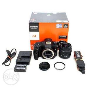 Sony alpha 57 with mm lens and box every