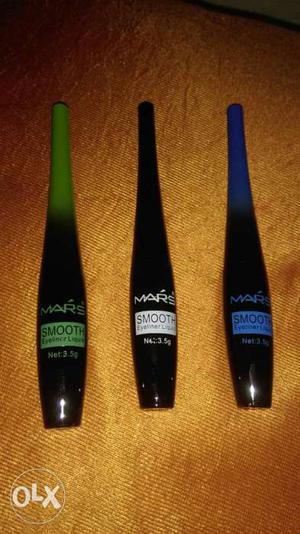 Three Mars Labeled Bottles