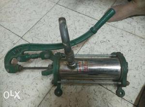 Want to sell Silver And Green Handheld Waterpump with fix