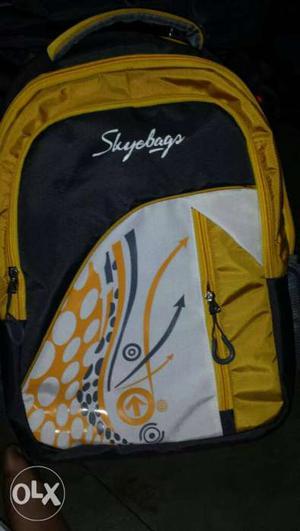 White, Blue, And Yellow Backpack