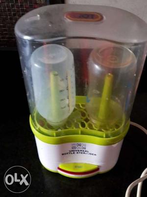 Baby's White And Green Bottled Sterilizer