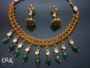 Golden artificial jewellery set kundan and pearl