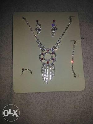 One necklace with earings,ring and bracelet also