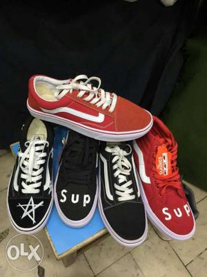 Pair Of Red Low Top Sneakers