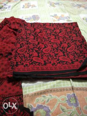 Red & black allover suit 4 mtrs. with cotton