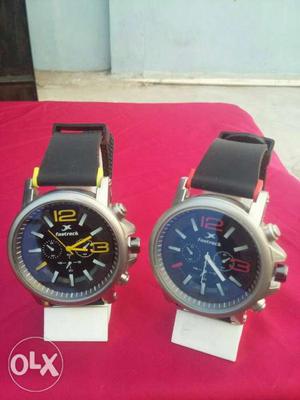 Two Round Black Chronograph Watches With Black Band