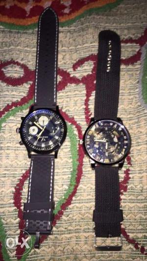 Two Round Black Chronograph Watches With Black Leather