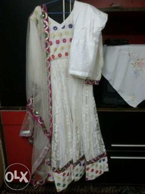 White long frock with colourful circular patterns