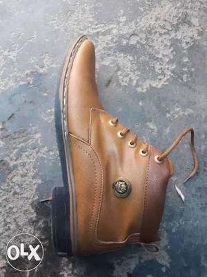paired Brown Leather Boot