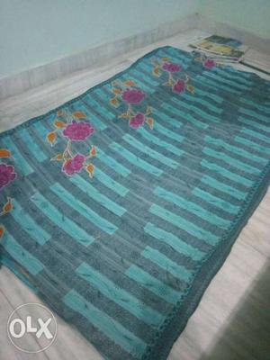 Bed gadda with floral cover