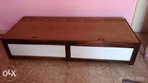 Brown Wooden box type single cot