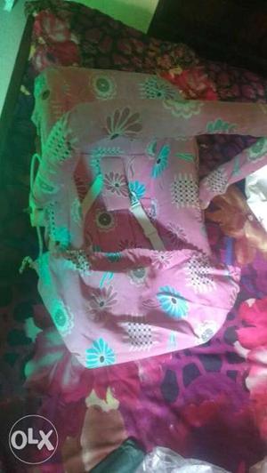 Pink And Multicolored Carrier