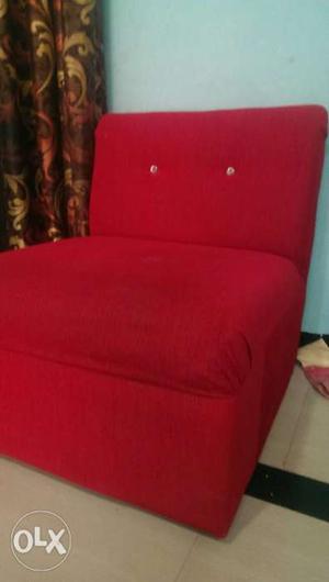 Red Fabric Sofa With Throw Pillows