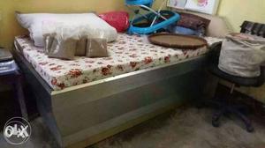 Single bed with matress and box inside...