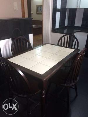 Solid malaysian teak dining table +4chairs. price