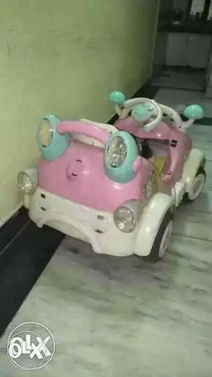 Toddler's Pink And White Ride-on Vehicle