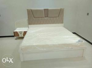 White Wooden Bed Frame With White Mattress