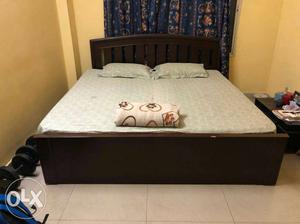 2 year old king sized mahogany colored bed. Good condition.