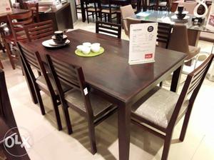 Brand new Evok dining table with 4 chairs