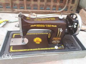 Brown And Yellow Sewing Machine