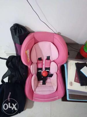 Child's Pink Safety Seat