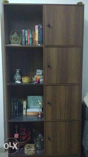 Dining table, Crockery Unit, Book Shelf and