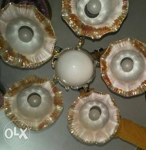 Four White And Brown Ceramic Plates