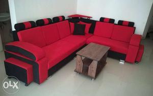 Red And Black Corner sofa with pillows