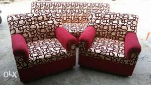 Two Brown Wooden Framed Red Padded Sofa Chairs