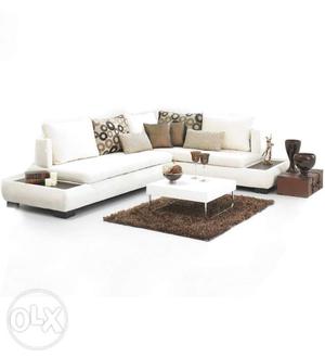 White Sectional Couch With Brown Pillows