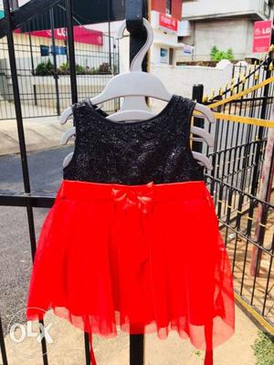 A beautiful black and red cimbunation frock with