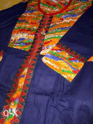 Blue, Yellow, And Red Floral Textile