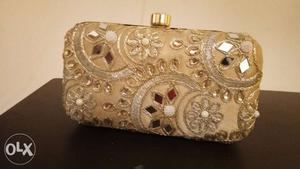 Brand new evening clutch -cream and golden