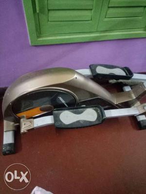 Gray And Brown Elliptical Trainer