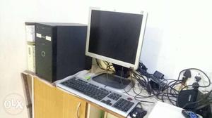 Gray Flat Screen Computer Monitor And Keyboard