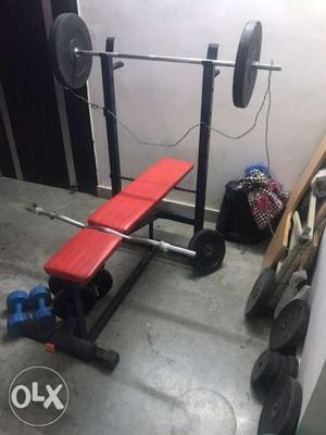 Gym set. 50 kg weights. bench press, curl rod,2