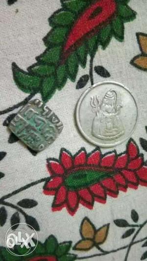 I wNt to sell my old two coin one is of Shiva