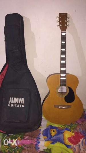 Jimm guitar with its cover. perfect condition