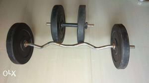 One long bar, one dumbbells bar and 4 five Kg disc