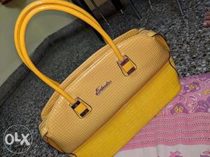 Original Esbeda handbag. Trendy yellow coloured
