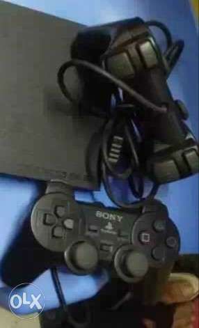 PS 2 two controllers, not used for one year with 3-4 games