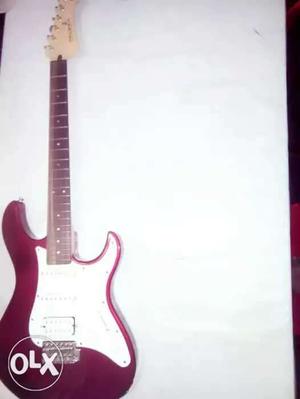 Red And White Stratocaster Electric Guitar