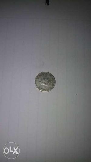 Round Gray British Indian Coin
