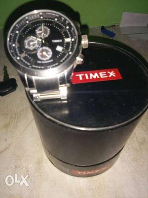 Round Silver-colored Timex Chronograph Watch With Link