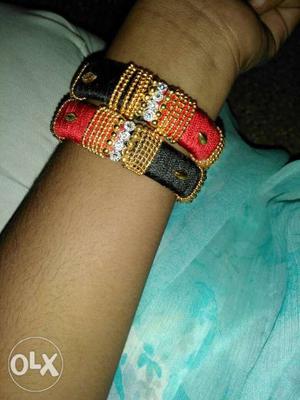 Two yellow and red Silk Thread Bangles