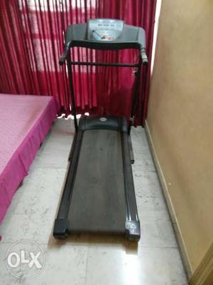 Black And Red Automatic Treadmill from Gymtrack company.