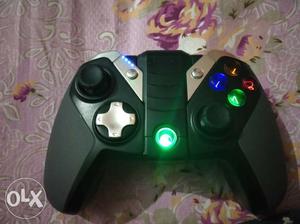 Black Game Console With Controller
