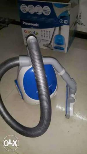 Blue And Gray Canister Vacuum Cleaner