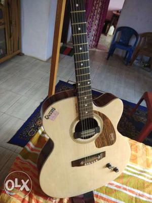 Brown And Black Single Cutaway Acoustic Guitar
