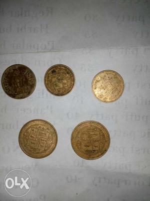 Five Round Brown Coins